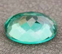 Attention grabbing 7.97ct emerald green Mystic Topaz