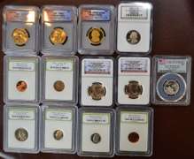 Lot Of 13 Coins In Plastic Holders.