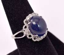 Captivating 8.65CTS Cabochon-Cut Star Sapphire & 0.39CTW Diamond Ring in Sterling Silver