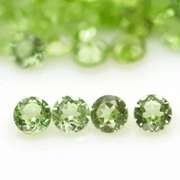 Fantastic 12.20ct round brilliant cut Peridot set