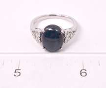 Brilliant 7.32CTS Cabochon-Cut Star Sapphire & 0.08CTW Diamond Ring in Sterling Silver