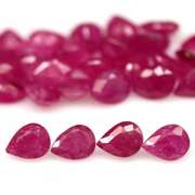 Heated only! 12.15ct violet red Ruby set