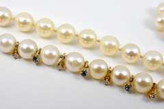 Long Strand of 8mm Pearls with Diamond Accents