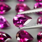 Ravishing 8.99ct violet pink Rhodolite Garnet set