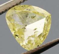 Amazing .60ct pear cut canary yellow Diamond