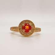 14kt Gold, Orange Garnet, & Diamond Halo Ring