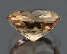 Exciting 3.11ct 9mm champagne Imperial Topaz solitaire