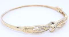 Pleasing Yellow Gold Diamond Baguette Crossover Bangle Bracelet