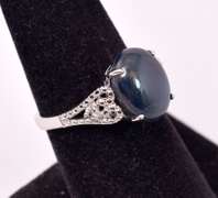 Brilliant 7.32CTS Cabochon-Cut Star Sapphire & 0.08CTW Diamond Ring in Sterling Silver
