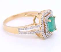 Attractive Emerald Cut Emerald in Double Halo Diamond Setting