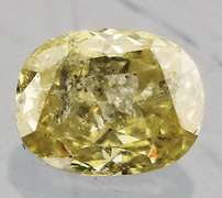 Rare .26ct oval cut canary yellow Diamond