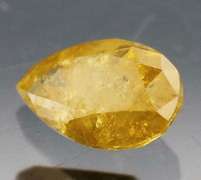 Rare .39ct pear cut yellow Diamond