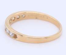 Favorite Yellow Gold Channel Set Diamond Band