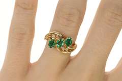 14K Yellow Gold 1.01 Ctw Oval Emerald Diamond Bypass Ring