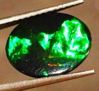 Gorgeous 1.72ct ribbon flashing Black Opal