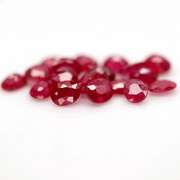 Vibrant 8.44ct oval cut imperial red Ruby set