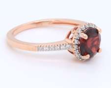 Handsome Rose Gold Garnet and Diamond Halo Ring