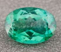 Attention grabbing 7.97ct emerald green Mystic Topaz