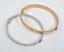 Set of White and Rose 14k Slave Bracelets