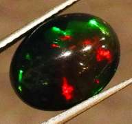 Gorgeous 1.72ct ribbon flashing Black Opal