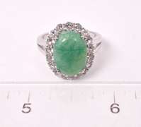 Captivating 5.08CTS Emerald and White Topaz Ring in Sterling Silver