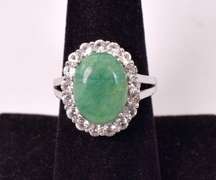 Captivating 5.08CTS Emerald and White Topaz Ring in Sterling Silver