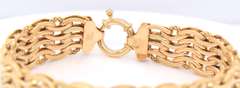 Handsome Yellow Gold High Polished and Textured Wave Wide Bracelet