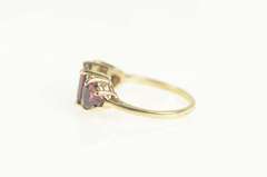 10K Yellow Gold Emerald Garnet Trillion Accent Three Stone Ring