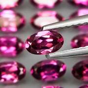 Ravishing 8.80ct violet pink Rhodolite Garnet set