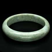 Stunning all natural 456.16ct floral Jadite Jade bangle