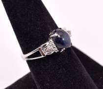 Lovely 3.29CTS Cabochon-Cut Star Sapphire & 0.11CTW Diamond Ring in Sterling Silver