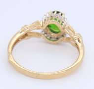 Charming Yellow Gold oval Peridot and Diamond Halo Ring