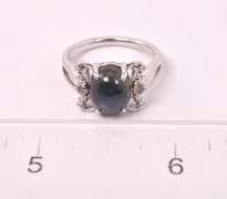 Dazzling 4.78CTS Cabochon-Cut Star Sapphire and 0.10CTW Diamond Ring in Sterling Silver