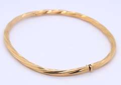 14KT Yellow Gold Twisted Design Oval Bangle