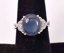 Incredible 8.61CTS Cabochon-Cut Star Sapphire & 0.09CTW Diamond Ring in Sterling Silver