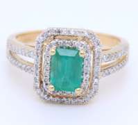 Attractive Emerald Cut Emerald in Double Halo Diamond Setting