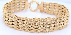 Handsome Yellow Gold High Polished and Textured Wave Wide Bracelet
