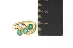 14K Yellow Gold 1.01 Ctw Oval Emerald Diamond Bypass Ring