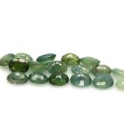 Fantastic 8.20ct green Sapphire set