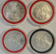 4 Diff. Superb Gem BU $1 Silver Eagles in custom capsules