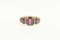 10K Yellow Gold Emerald Garnet Trillion Accent Three Stone Ring