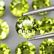 Dazzling 7.98ct untreated apple green Peridot set