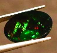 Gorgeous 1.72ct ribbon flashing Black Opal