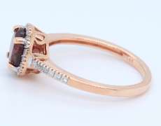 Handsome Rose Gold Garnet and Diamond Halo Ring