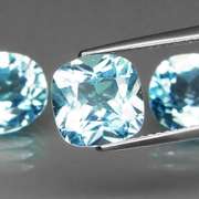 Large 11.91ct vivid blue mixed cut Topaz set