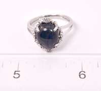 Wonderful 6.65CTS Sapphire and 0.09CTW Diamond Ring in Sterling Silver