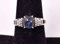 Lovely 3.29CTS Cabochon-Cut Star Sapphire & 0.11CTW Diamond Ring in Sterling Silver