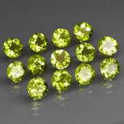 Fantastic 7.00ct 5mm round brilliant cut Peridot set