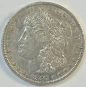 Solid AU 1897-O Morgan Silver Dollar. Better date