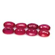 Vibrant 8.22ct oval cut imperial red Ruby set
